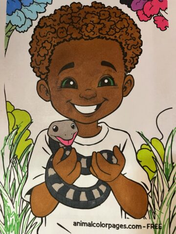 a cheerful scene featuring an African American boy with curly hair s. He stands confidently with a friendly snake gently coiled around one of his arms, demonstrating their unique bond.